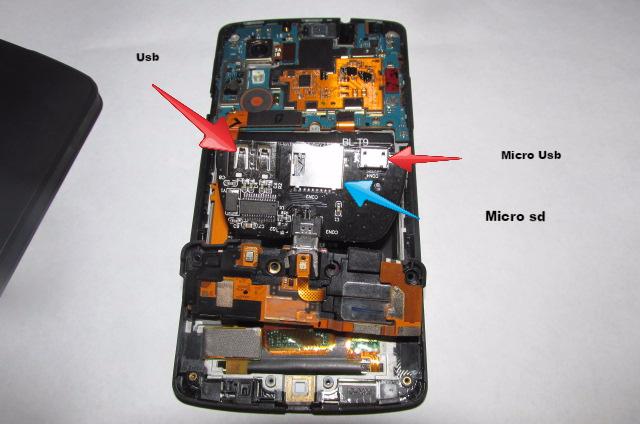 Парень просто добавил слот MicroSD в Nexus 5